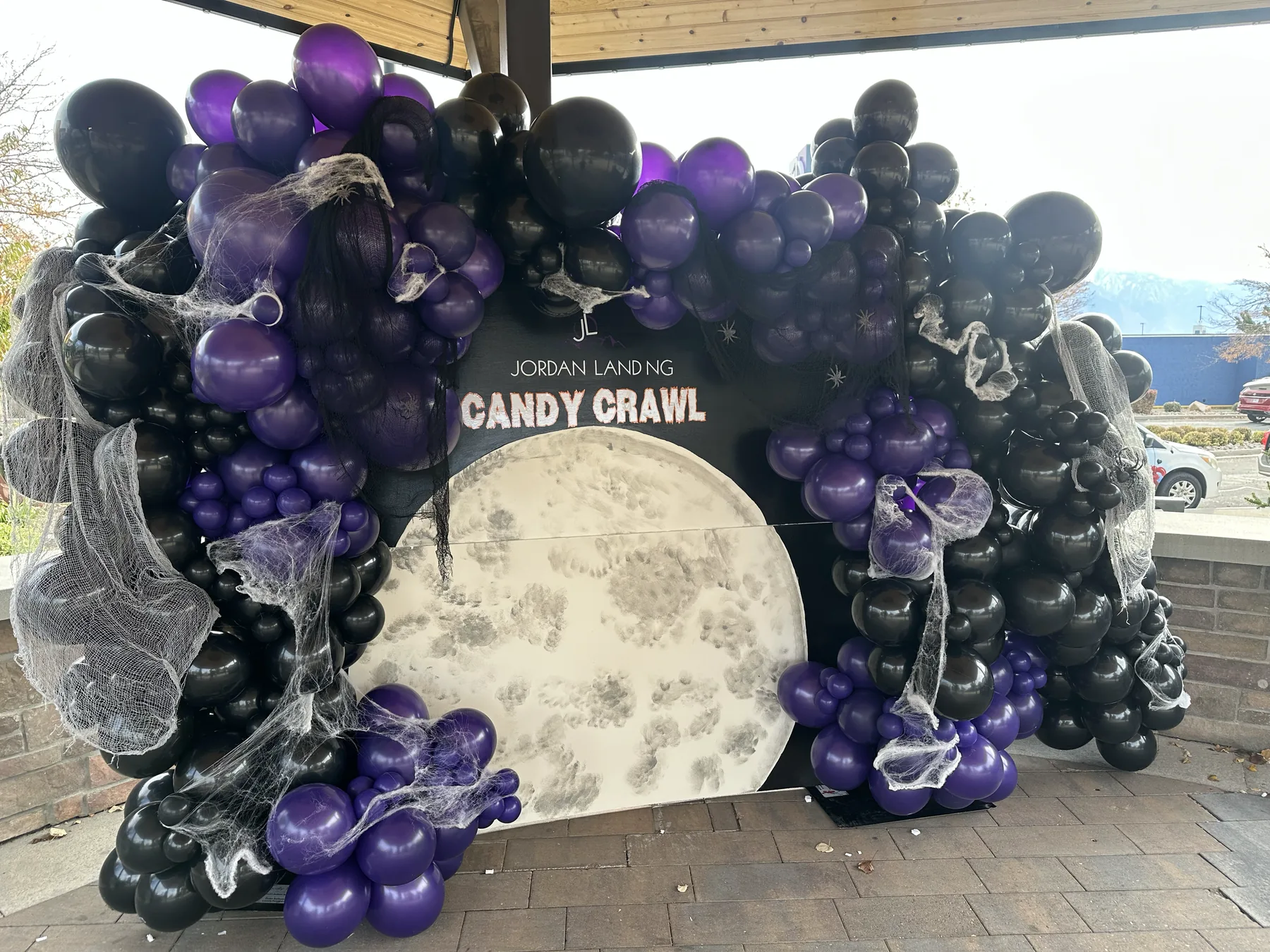 Custom Halloween balloon backdrop for a branded event